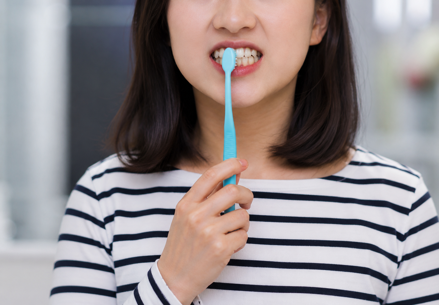 Brushing Hard: How It Can Damage Your Teeth and Gums